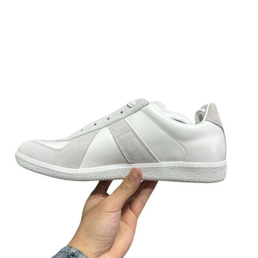 Luxury Chef white leather and suede low-top sneakers with grey accents and white laces.