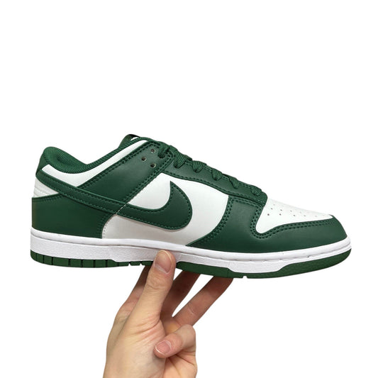 Luxury Chef Nike Dunk Low green and white leather sneakers with a classic low-top design and rubber sole.