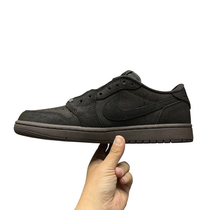 Luxury Chef Air Jordan 1 Low Travis Scott dark brown suede sneakers with tonal stitching and rubber sole.