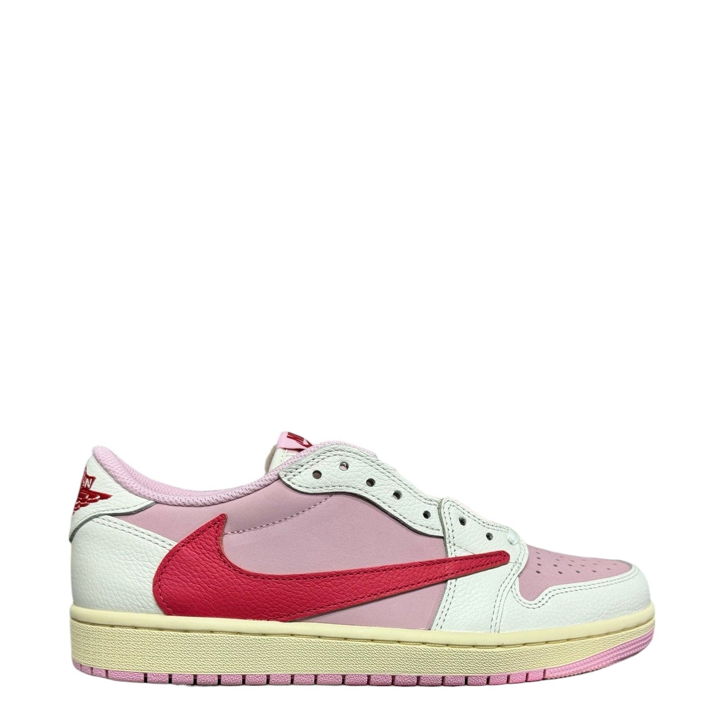 Luxury Chef Air Jordan 1 Low Travis Scott sneakers in pink and white leather with red accents.