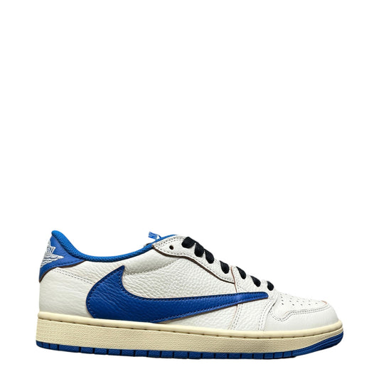 Luxury Chef Air Jordan 1 Low Travis Scott sneakers in white tumbled leather with royal blue accents and a cream midsole.