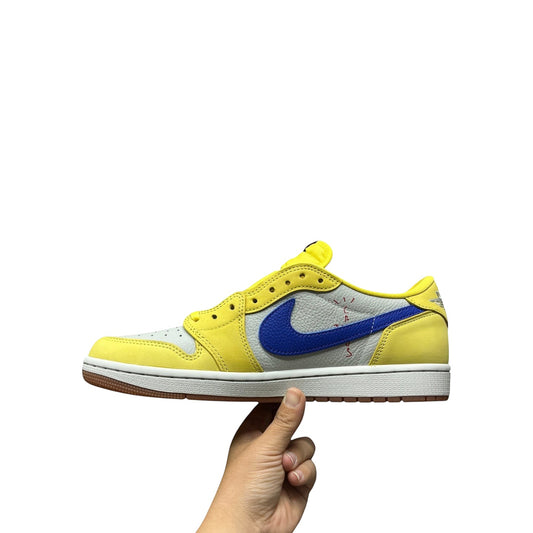 Luxury Chef Air Jordan 1 Low Travis Scott sneakers in yellow, grey, and blue with a gum sole.