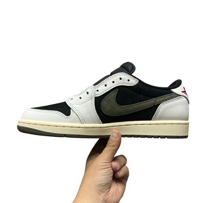 Luxury Chef Air Jordan 1 Travis Scott low-top sneakers in black, white, and olive green suede with cream sole.