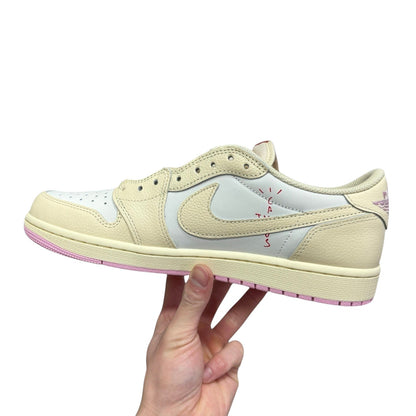 Luxury Chef Air Jordan 1 Low Travis Scott sneakers in cream and white leather with pink accents and red stitching.