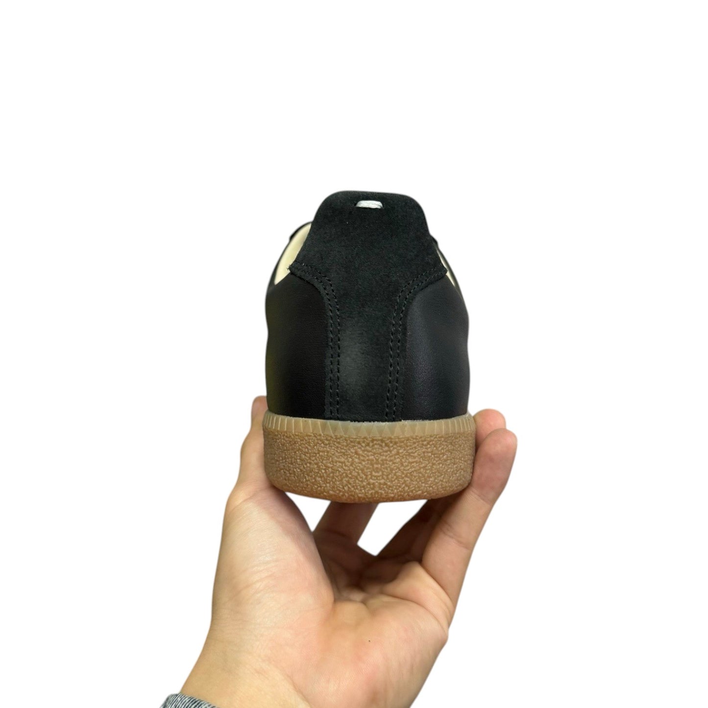 Luxury Chef MAISON MARGIELA black leather and suede sneakers with gum sole.