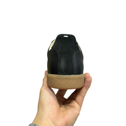 Luxury Chef MAISON MARGIELA black leather and suede sneakers with gum sole.