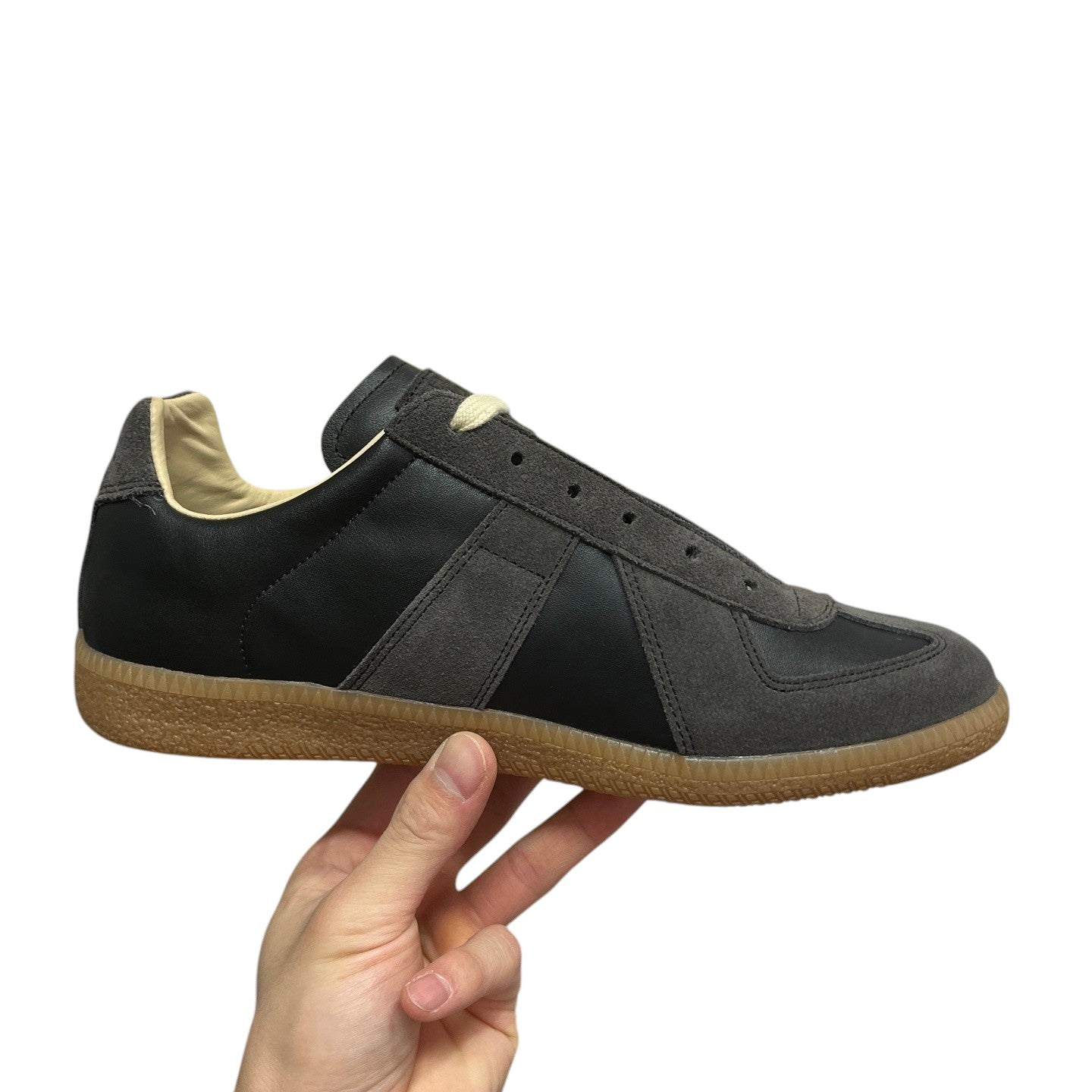 Luxury Chef MAISON MARGIELA dark grey and black suede and leather sneakers with gum sole.