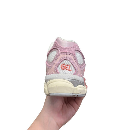 Luxury Chef pink and white mesh and suede athletic sneakers with GEL branding on heel.