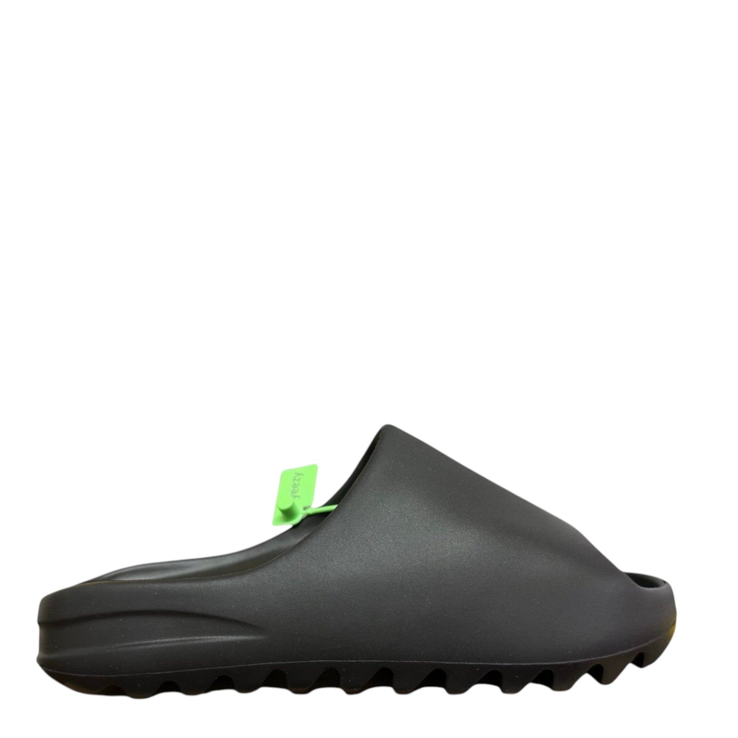 Luxury Chef YEEZY SLIDE in black, featuring a comfortable slip-on design and a textured sole.