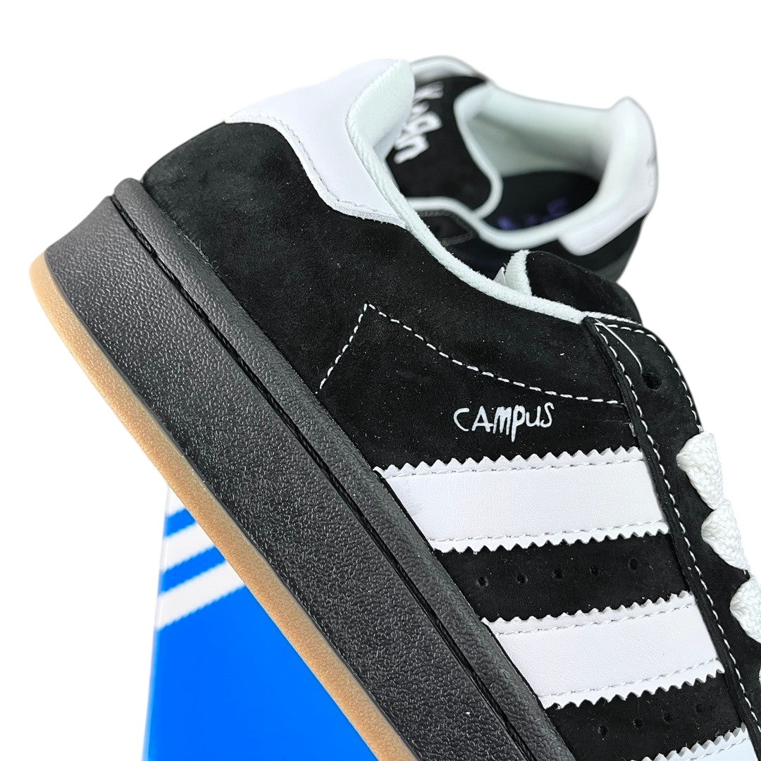 Luxury Chef Adidas Campus black suede sneakers with white stripes and gum sole.
