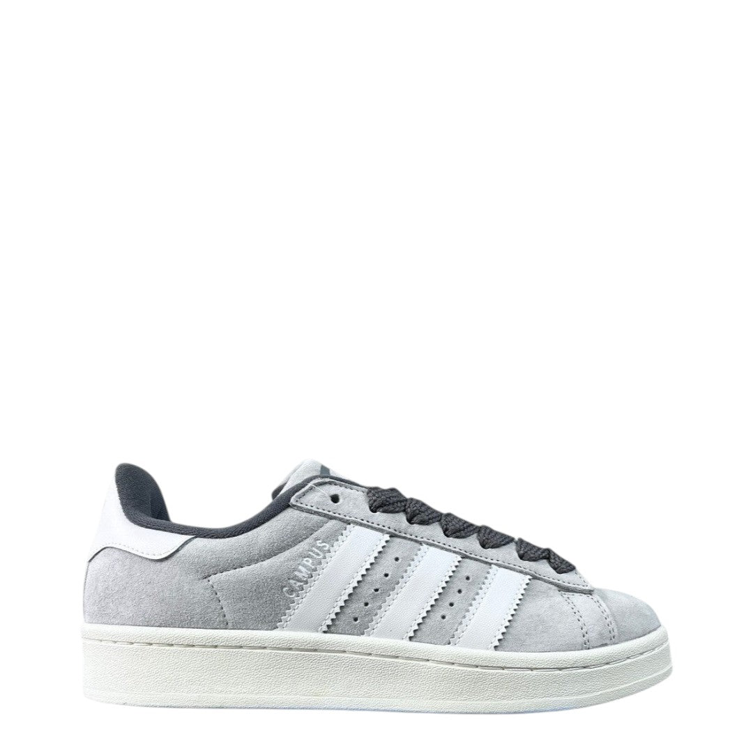Luxury Chef Adidas Campus grey suede sneakers with white stripes and laces. Classic low-top design.