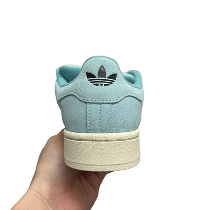 Luxury Chef Adidas Campus light blue suede sneakers with cream sole and black trefoil logo.