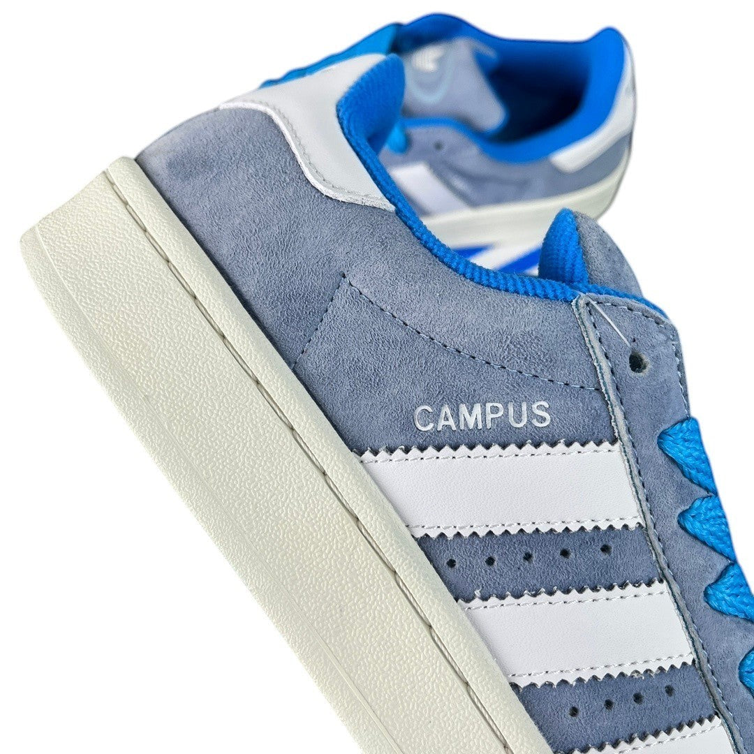 Luxury Chef Adidas Campus light blue suede and white leather sneakers with blue laces and cream sole.