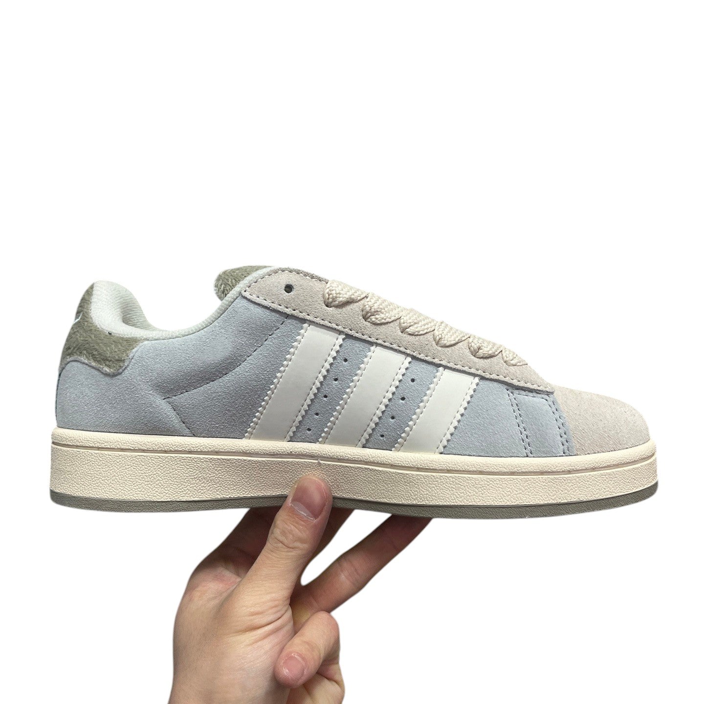 Luxury Chef light blue suede Adidas Campus sneakers with white stripes and cream sole.