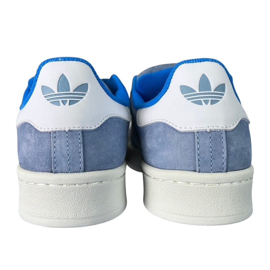 Luxury Chef Adidas Campus sneakers in light blue suede with white accents and blue lining. Features Adidas trefoil logo.