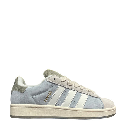 Luxury Chef Adidas Campus light blue suede sneakers with white stripes and cream sole. Gold 'CAMPUS' text on side.