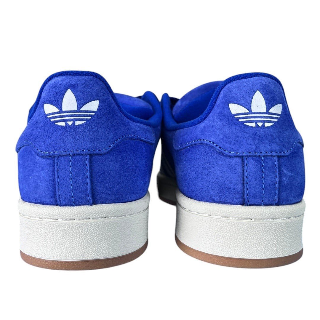 Luxury Chef ADIDAS CAMPUS royal blue suede sneakers with white Adidas logo on heel and white rubber sole.