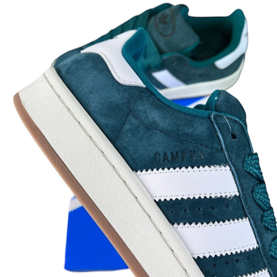 Luxury Chef Adidas Campus teal suede sneakers with white stripes and gum sole.