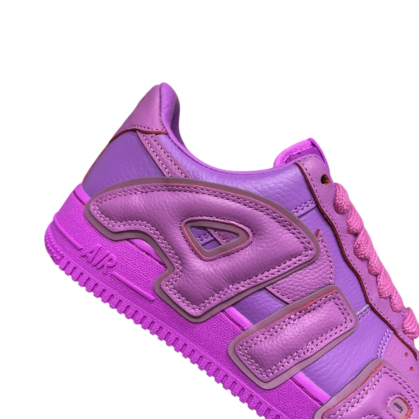 Luxury Chef Air Force 1 CPFM sneakers in vibrant purple leather with unique layered detailing and textured laces.