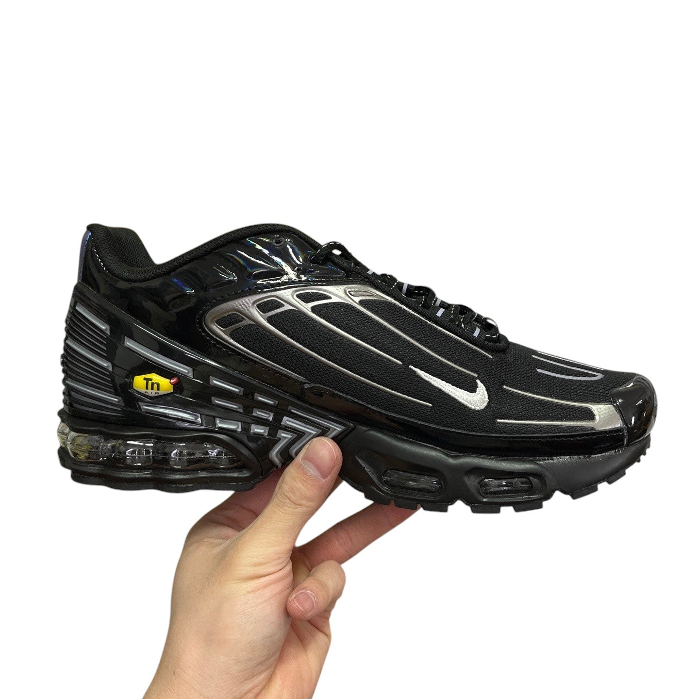 Luxury Chef Air Max 270 black sneakers with silver accents and visible air cushioning. Mesh and synthetic upper.