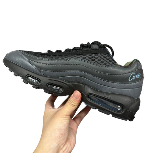 Luxury Chef Air Max 95 Corteiz sneakers in dark grey leather and mesh with visible air cushioning.