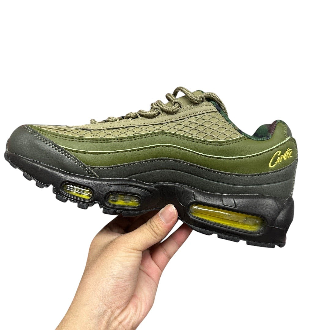 Luxury Chef AIR MAX 95 CORTEIZ olive green sneakers with black accents and yellow air cushioning.