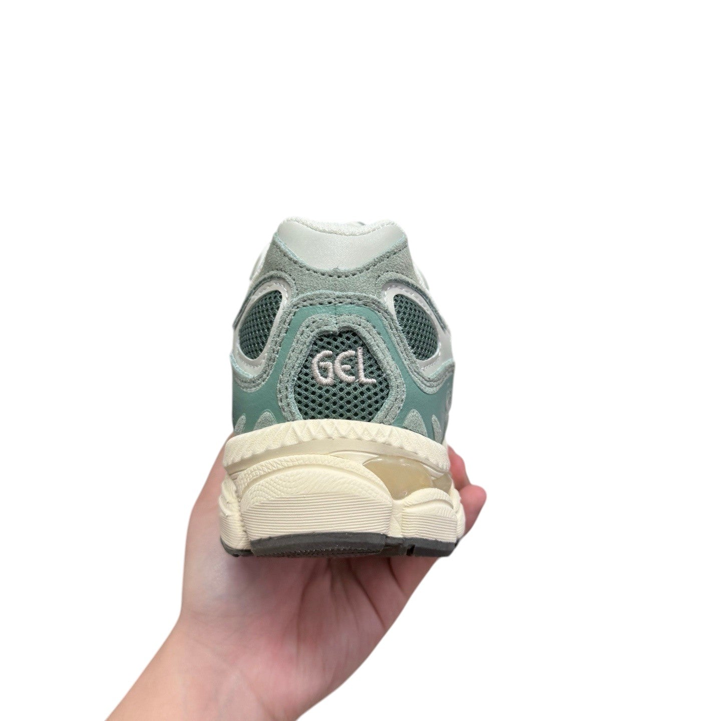 Luxury Chef ASICS GEL-NYC sneakers in light green with GEL branding on the heel and a cream sole.