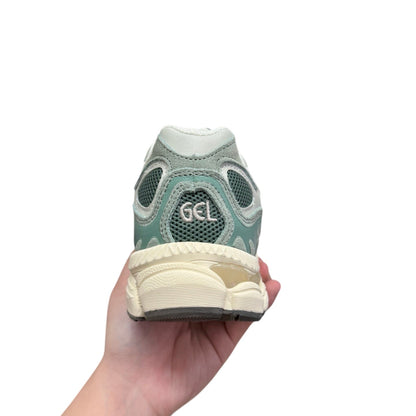 Luxury Chef ASICS GEL-NYC sneakers in light green with GEL branding on the heel and a cream sole.