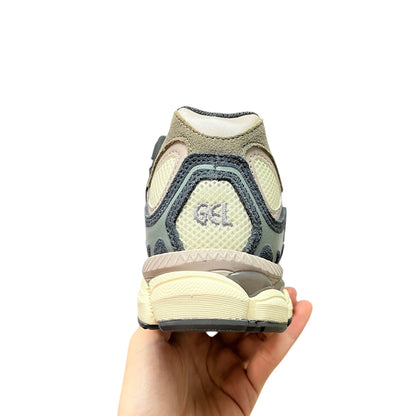 Luxury Chef ASICS GEL-NYC men's sneakers in beige, grey, and light blue with GEL cushioning.