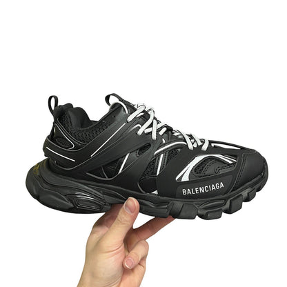 Luxury Chef Balenciaga Track black sneakers with white laces and chunky sole. Mesh and synthetic upper.