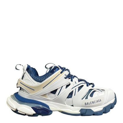 Luxury Chef BALENCIAGA Track sneakers in white, blue, and beige with mesh panels and chunky sole.