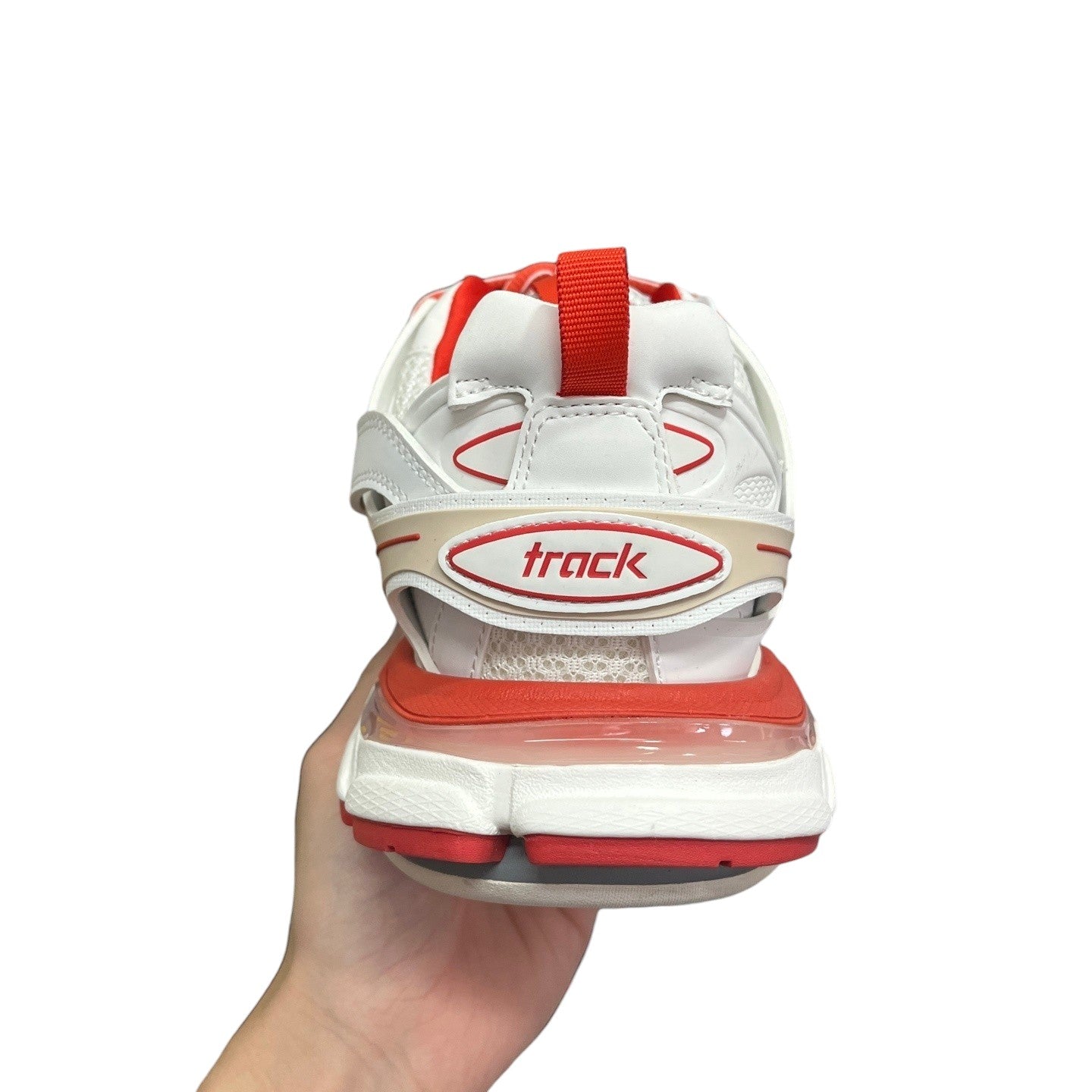 Luxury Chef BALENCIAGA TRACK white and red leather and mesh sneakers with clear sole detail.