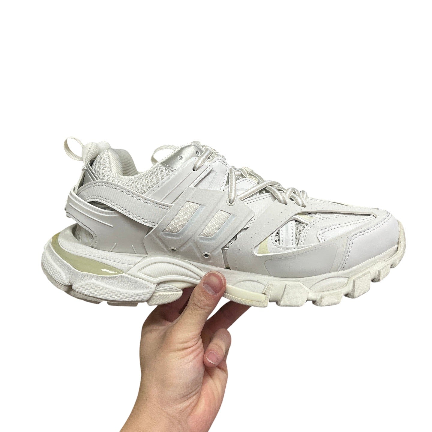 Luxury Chef BALENCIAGA TRACK white leather and mesh chunky sneakers with cut-out heel detail.