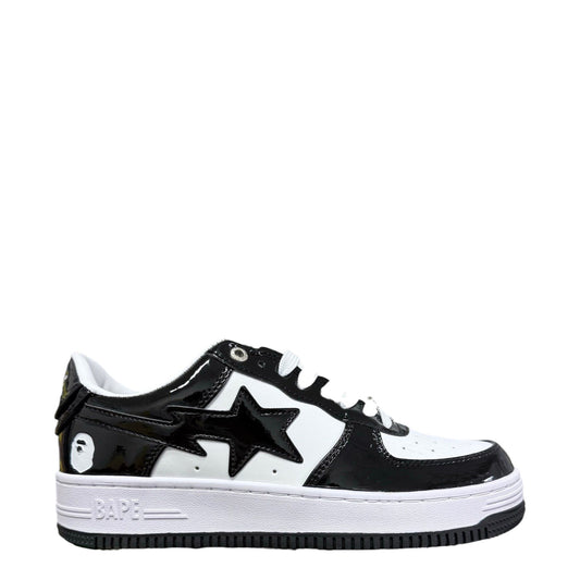 Luxury Chef BAPESTA sneakers in black and white patent leather with a star logo and ape head detail.