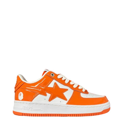 Luxury Chef BAPESTA orange and white patent leather sneakers with star detail and BAPE logo on sole.