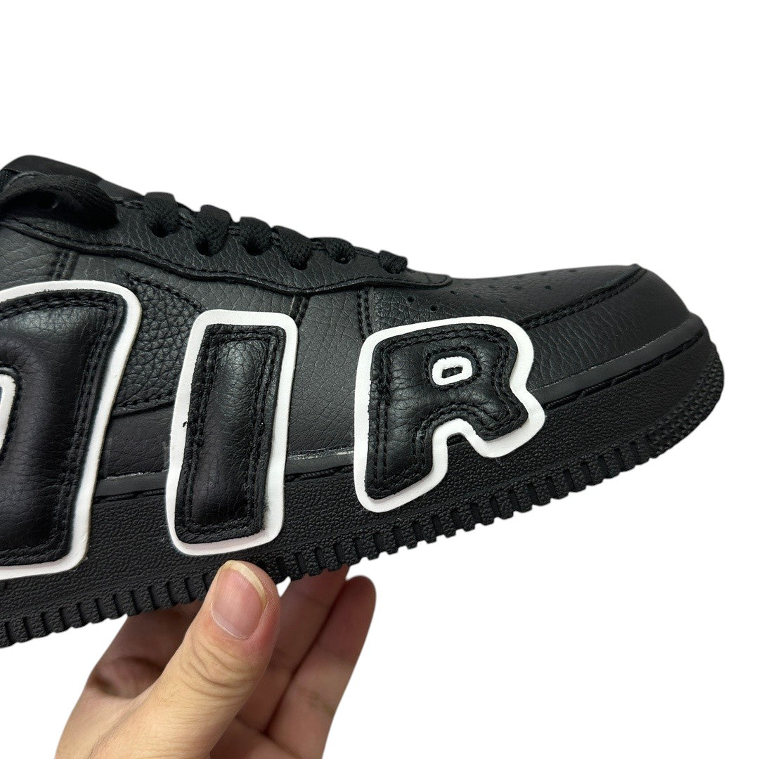 Luxury Chef black leather Air Force 1 CPFM sneakers with white trim and bold lettering.