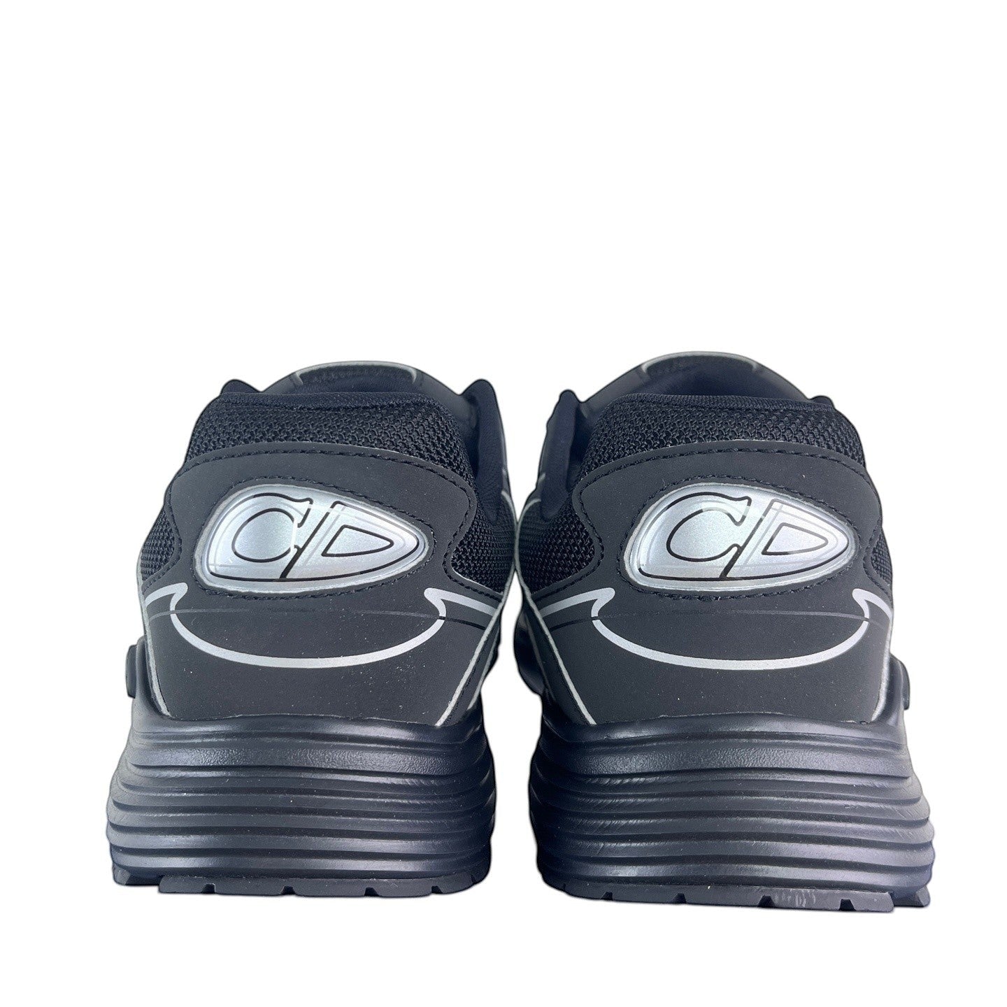 Luxury Chef black mesh and leather DIOR B30 sneakers with silver CD logo detail and white trim.