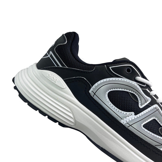 Luxury Chef DIOR B30 black and silver mesh and leather sneakers with white soles.