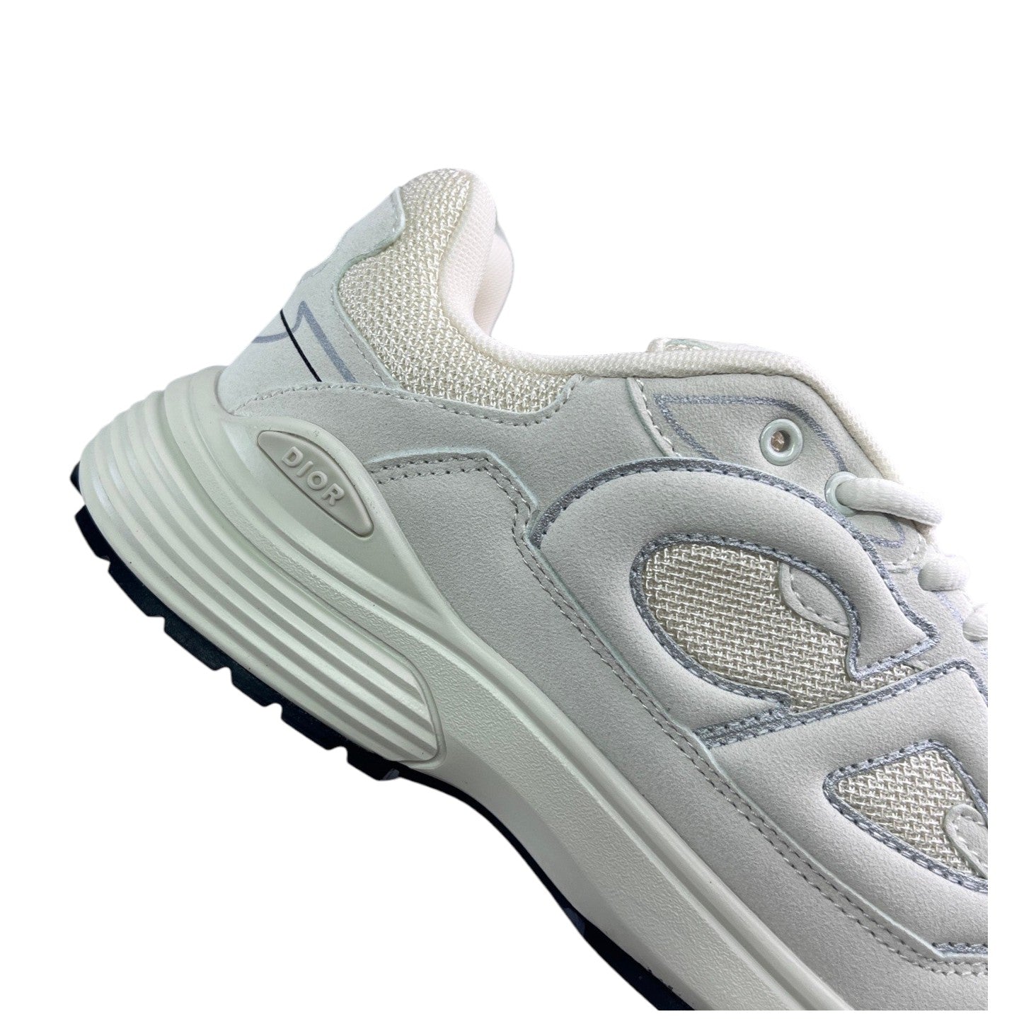 Luxury Chef DIOR B30 off-white suede and mesh sneakers with textured sole and subtle branding.