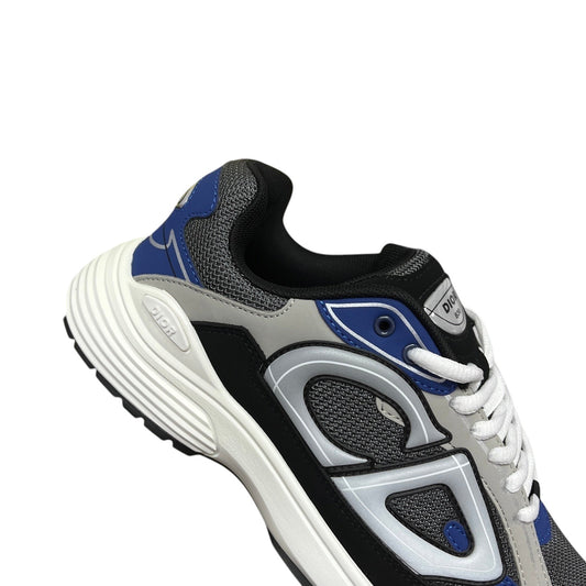 Luxury Chef DIOR B30 sneakers with grey, black, and blue accents. Features a chunky white sole and mesh detailing.