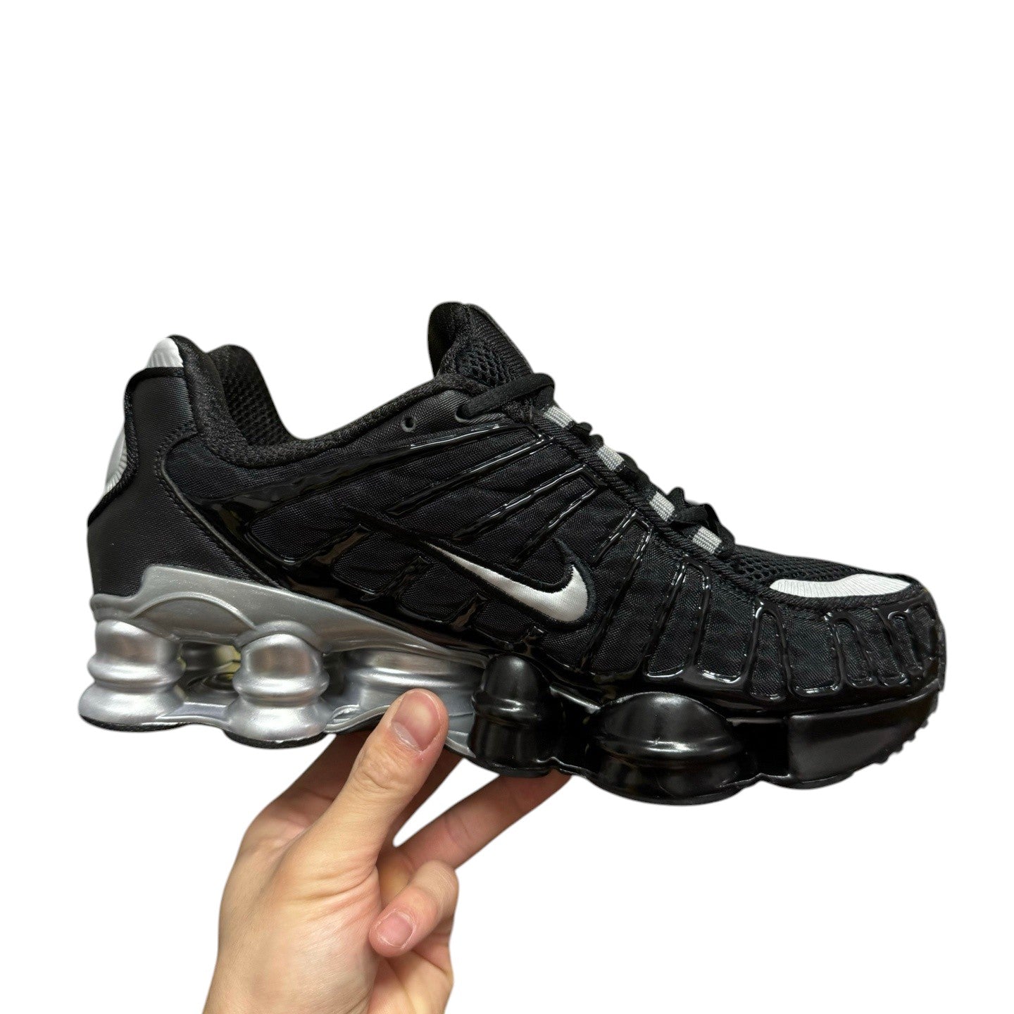 Luxury Chef KOBE 6 black sneakers with silver accents and signature Nike swoosh. Features a unique Shox sole.