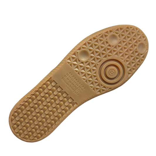 Luxury Chef Maison Margiela tan gum sole with numerical sizing and circular detail.