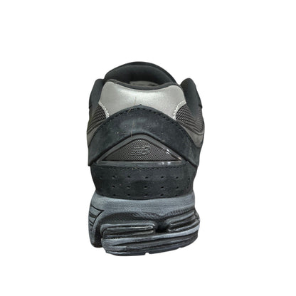 Luxury Chef New Balance 2002R black suede and mesh sneakers with grey accents.