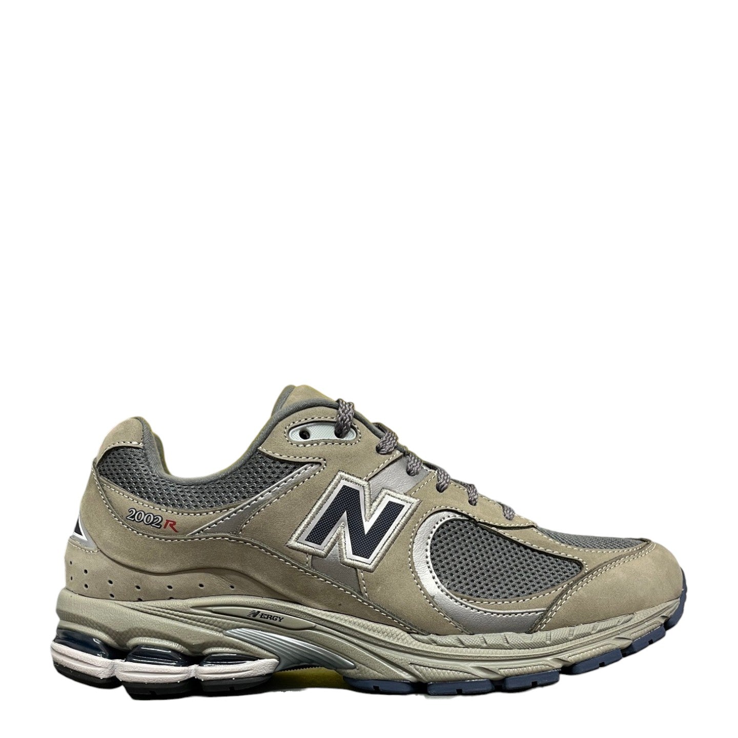 Luxury Chef New Balance 2002R grey suede and mesh sneakers with navy N logo and blue sole accents.