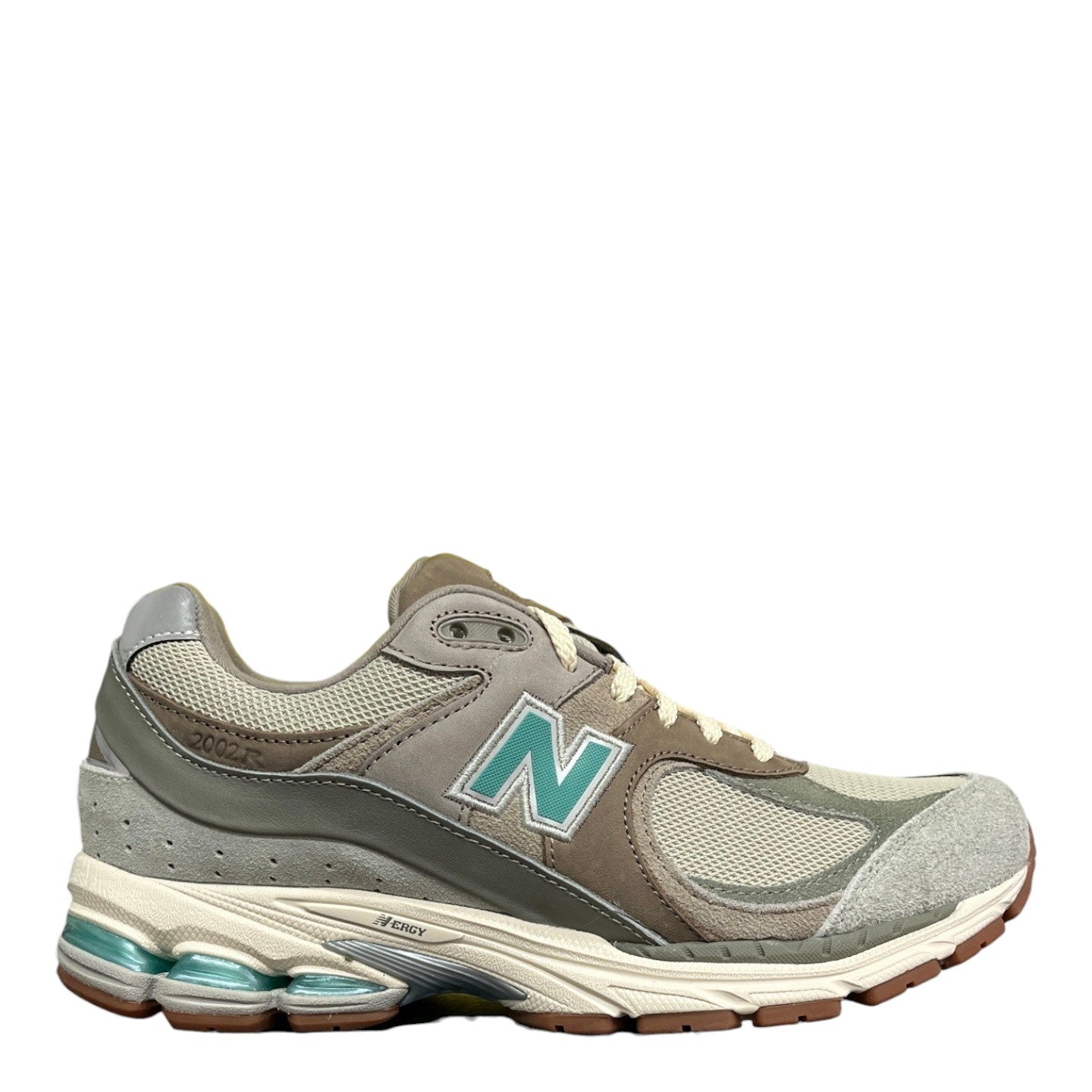 Luxury Chef New Balance 2002R men's lifestyle sneakers in grey, brown, and teal with suede and mesh details.