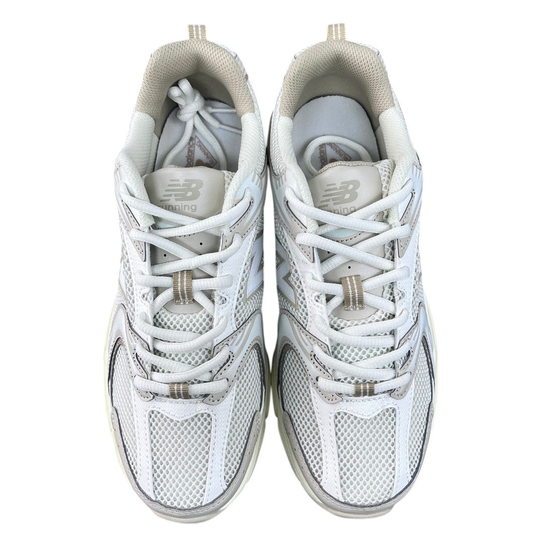 Luxury Chef New Balance 530 off-white mesh and leather sneakers with tan accents and white laces.