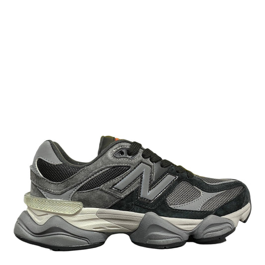 Luxury Chef New Balance 9060 sneakers in black and grey suede with mesh panels and a chunky sole.