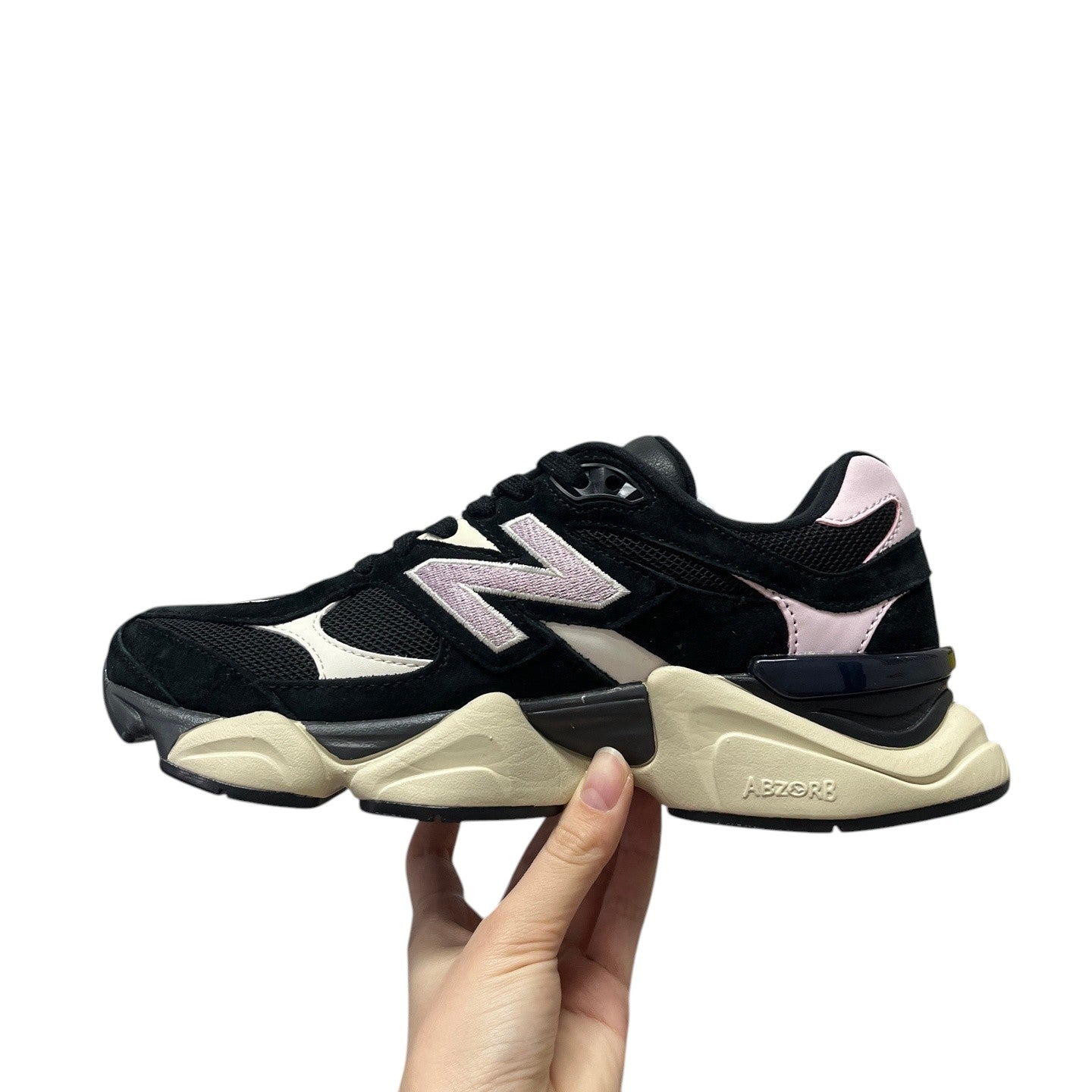 Luxury Chef New Balance 9060 black suede sneakers with white and light pink accents and ABZORB sole.