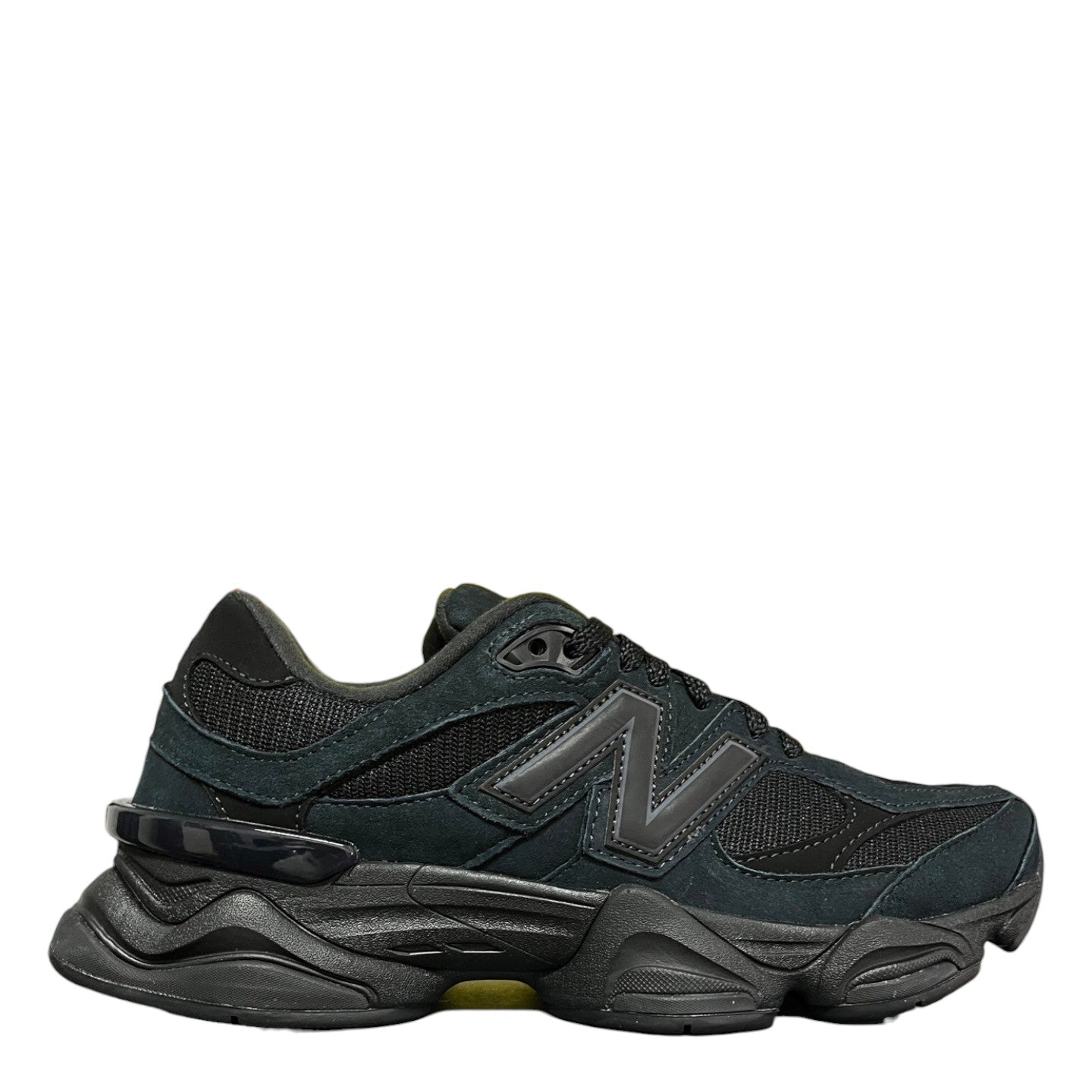 Luxury Chef New Balance 9060 black suede and mesh sneakers with chunky sole.