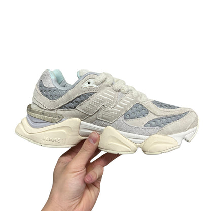 Luxury Chef New Balance 9060 sneakers in cream and light blue with fuzzy trim and ABZORB cushioning.